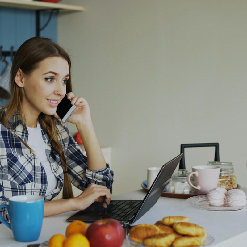 Woman requesting a cleaning quote from home